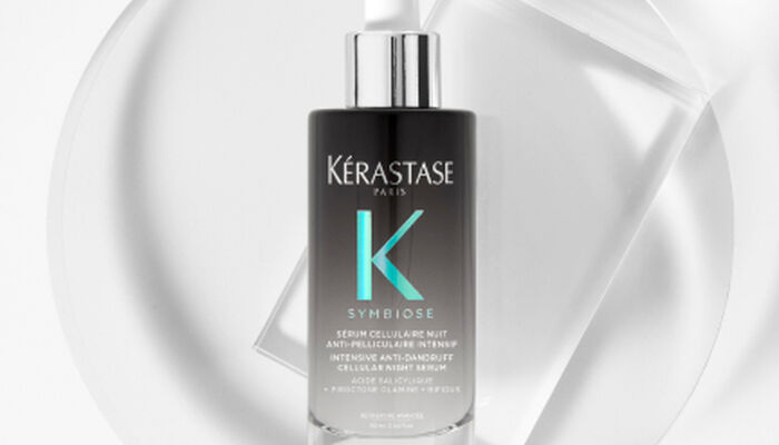 Blond Absolu Ultra Violet Shampoo squeezed into hand