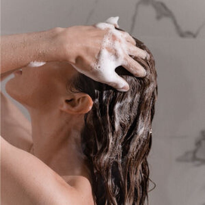 Kerastase tips to protect from hard water - model lathering shampoo