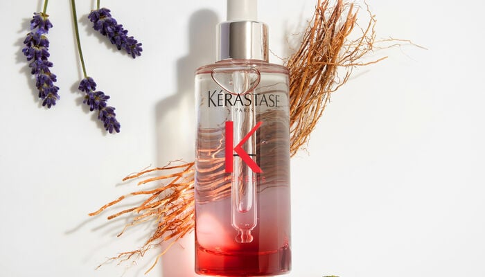 Blond Absolu Ultra Violet Shampoo squeezed into hand