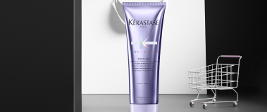 Blond Absolu conditioner against Parisian night scene