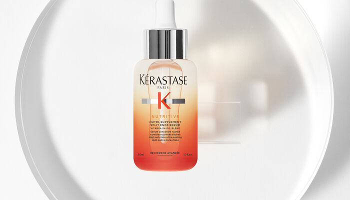 Blond Absolu Ultra Violet Shampoo squeezed into hand